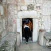 The former very large gate to the Church of Nativity was lowered and narrowed around 1500 to prevent riders and trolleys from entering and robbing the church